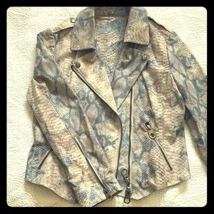 Faux sneak-skin jacket. Some signs of wear.